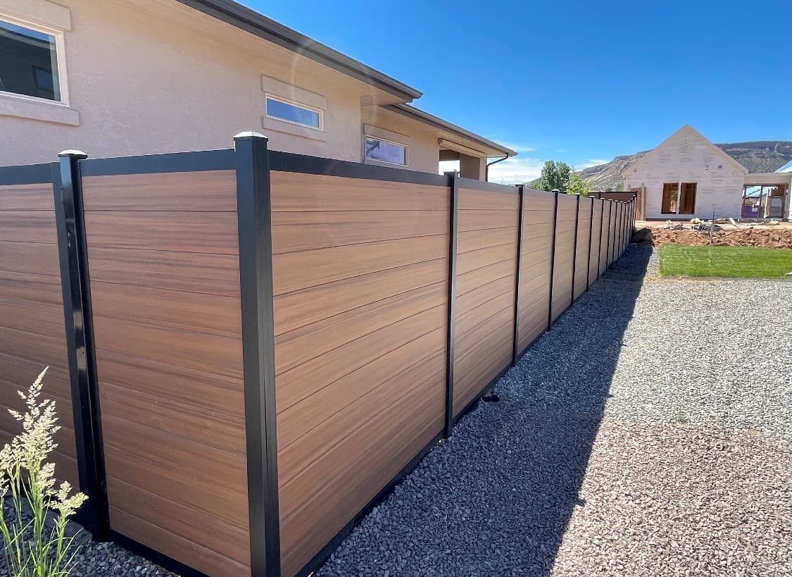 Horizontal composite fence, new build by SG Landscaping